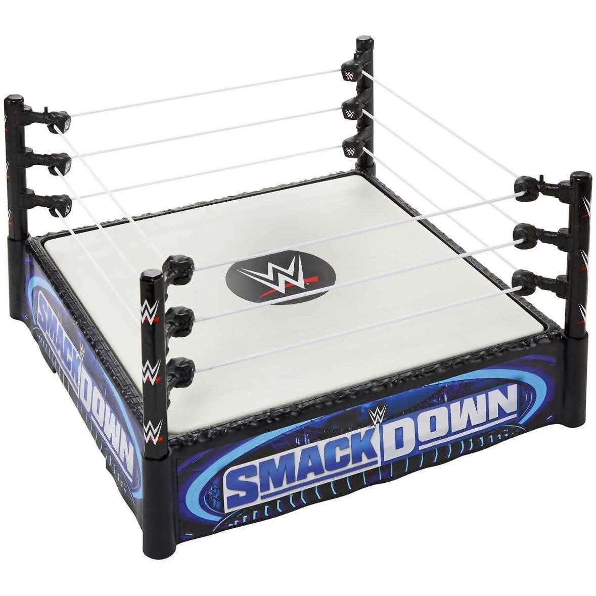 WWE - WWE Superstar Ring Playset With Spring-loaded Mat & 4 Event Apron Stickers (14-inch) - Mattel