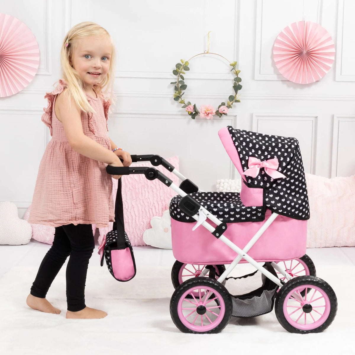 Bayer - Doll Pram Trendy Pink with Black Hood & Pink Bow