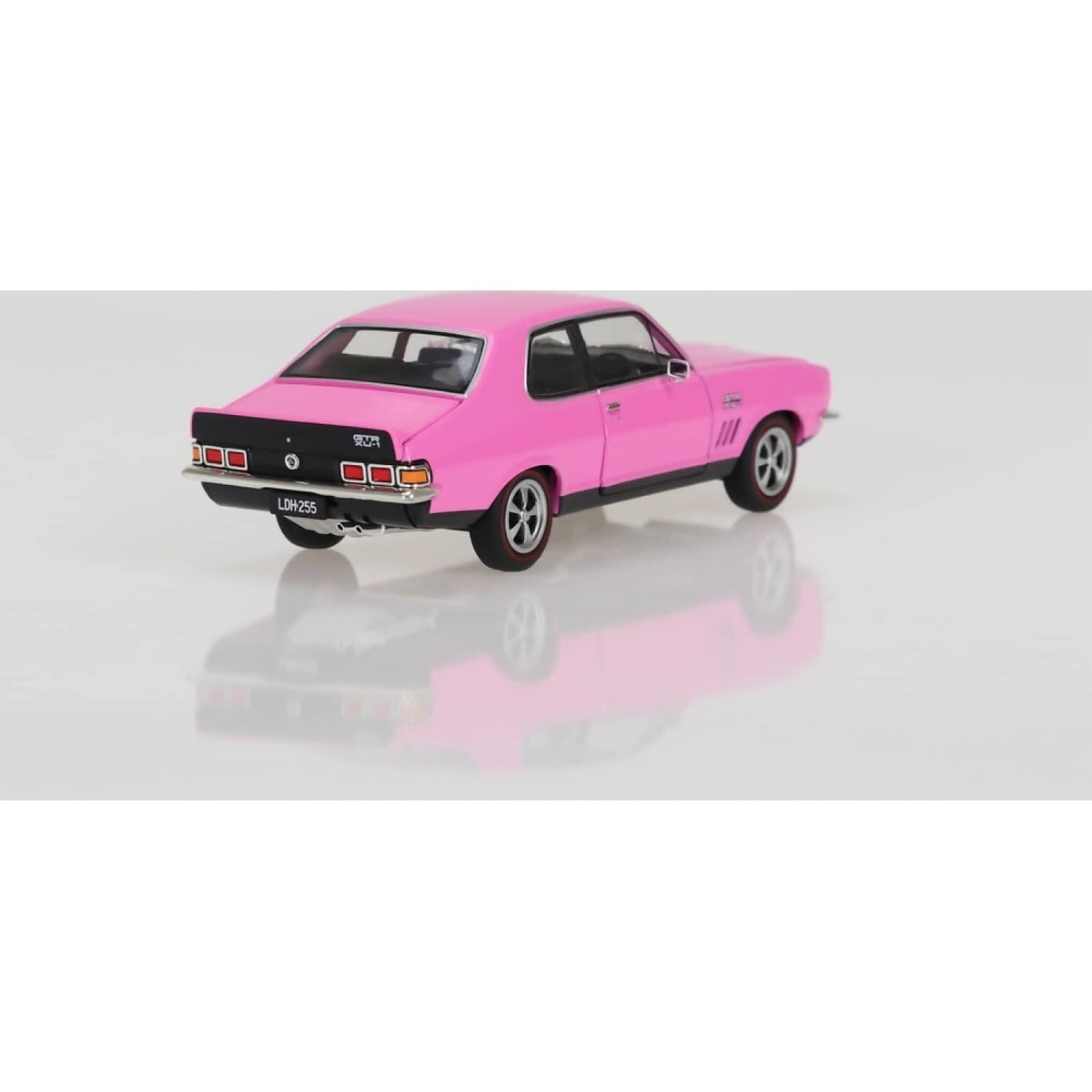 DDA COLLECTIBLES - 1:24 SCALE -STRIKE ME PINK LJ 308 HOLDEN TORANA - DIECAST MODEL