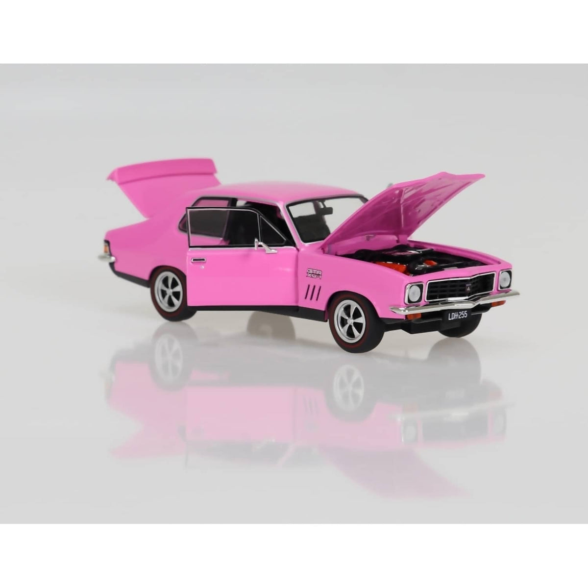 DDA COLLECTIBLES - 1:24 SCALE -STRIKE ME PINK LJ 308 HOLDEN TORANA - DIECAST MODEL