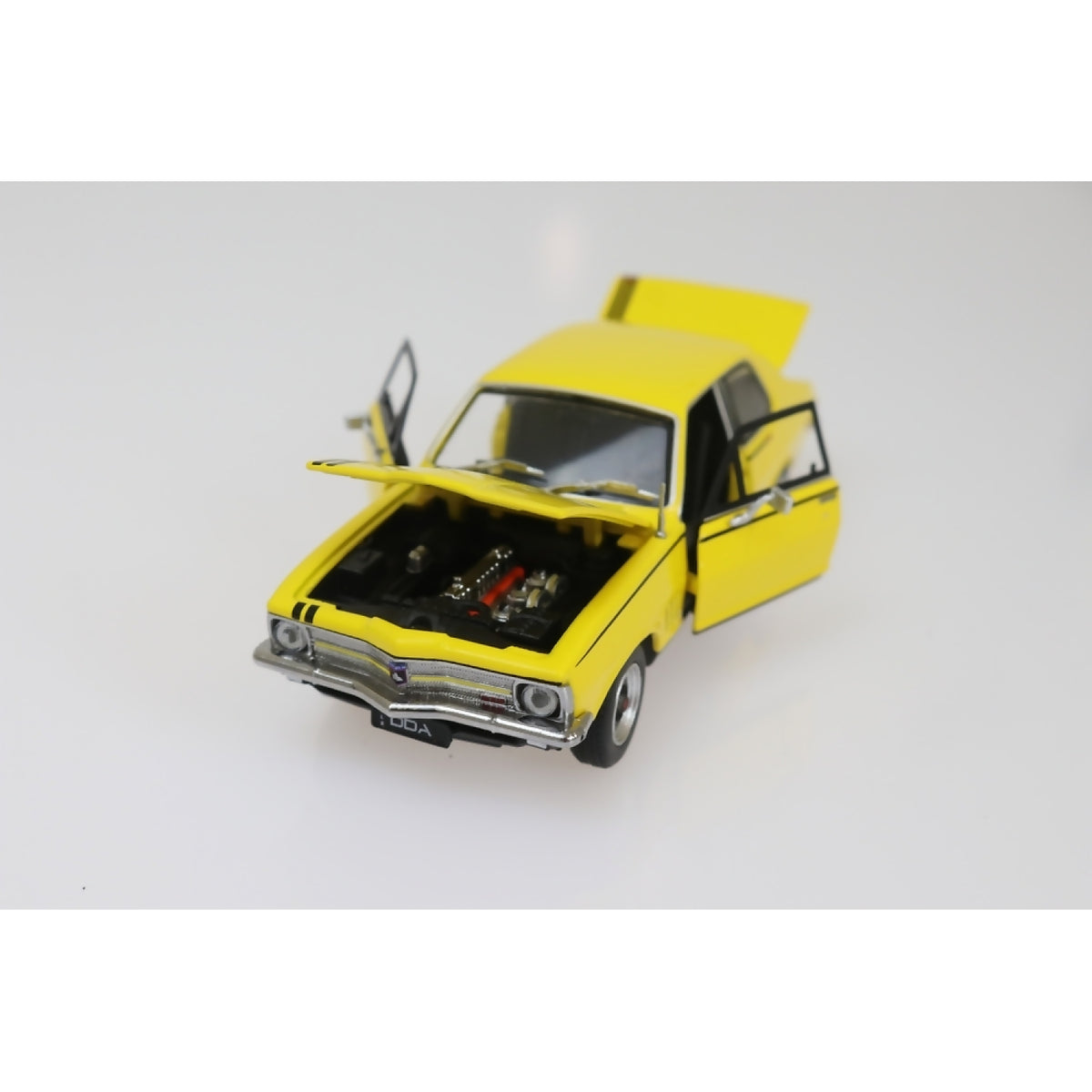 DDA COLLECTIBLES - 1:32 SCALE - YELLOW LC GTR HOLDEN TORANA - DIECAST MODEL